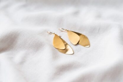 Gold sustainable ethical conscious bridal majestic mussel earrings styling image
